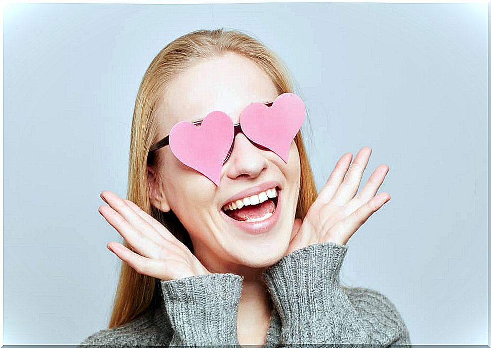 Woman with heart shaped glasses